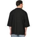 Black - Lifestyle - Casual Classics Unisex Adult Combed Ringspun Cotton Extended Neckline Oversized Short-Sleeved T-Shirt