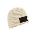 Oatmeal-Black - Front - Beechfield Fashion Woven Patch Beanie