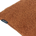 Rust - Close up - Paoletti Nellim Bouclé Textured Cushion Cover