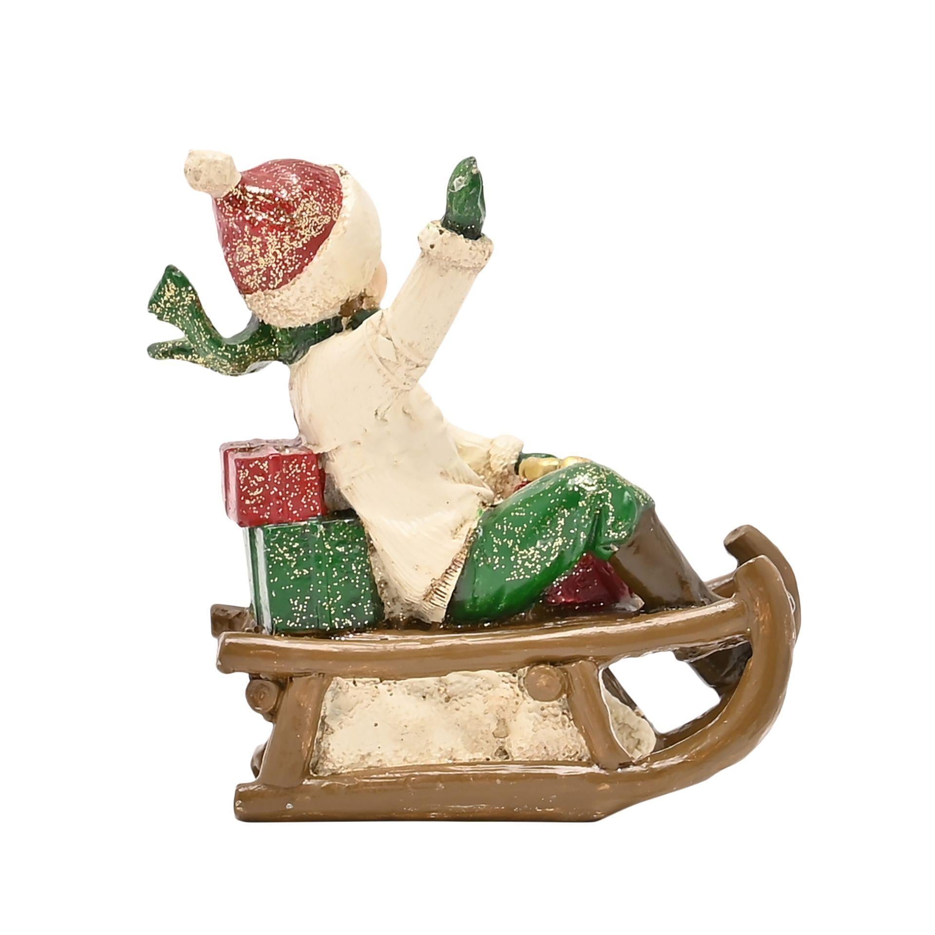 White - Side - The Seasonal Gift Co. Victorian Boy On Sledge Figurine